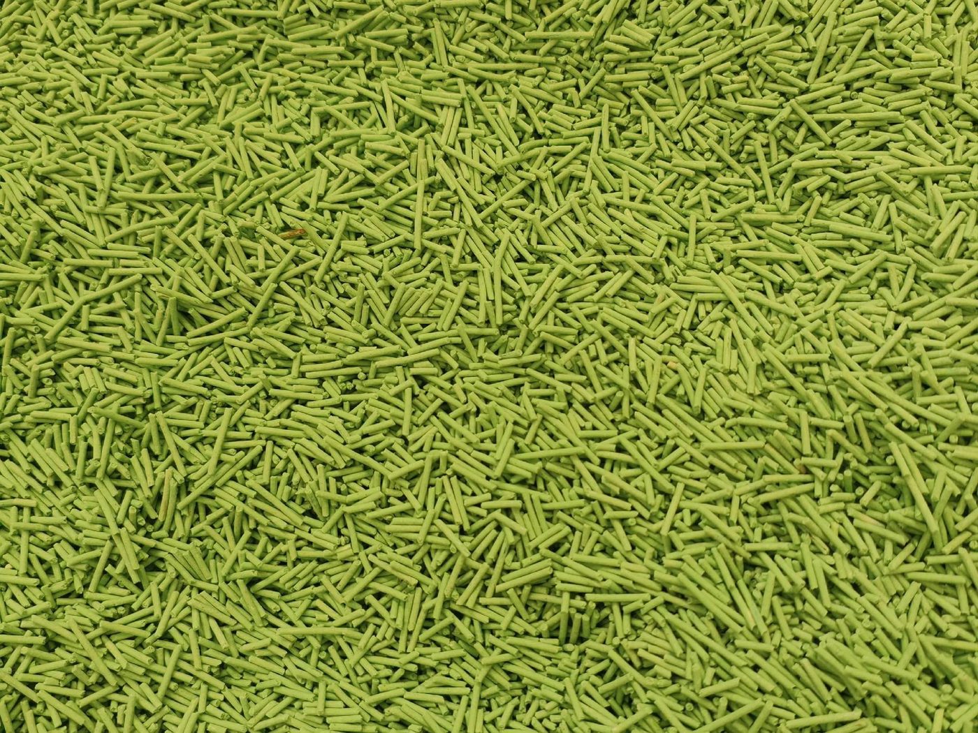 Green coloured tofu cat litter granules